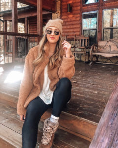 Cozy sherpa jacket on a cabin vacation